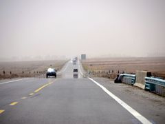 05 Paved Highway With Industrial Complex Ahead On The Way From Kashgar To Yarkand.jpg